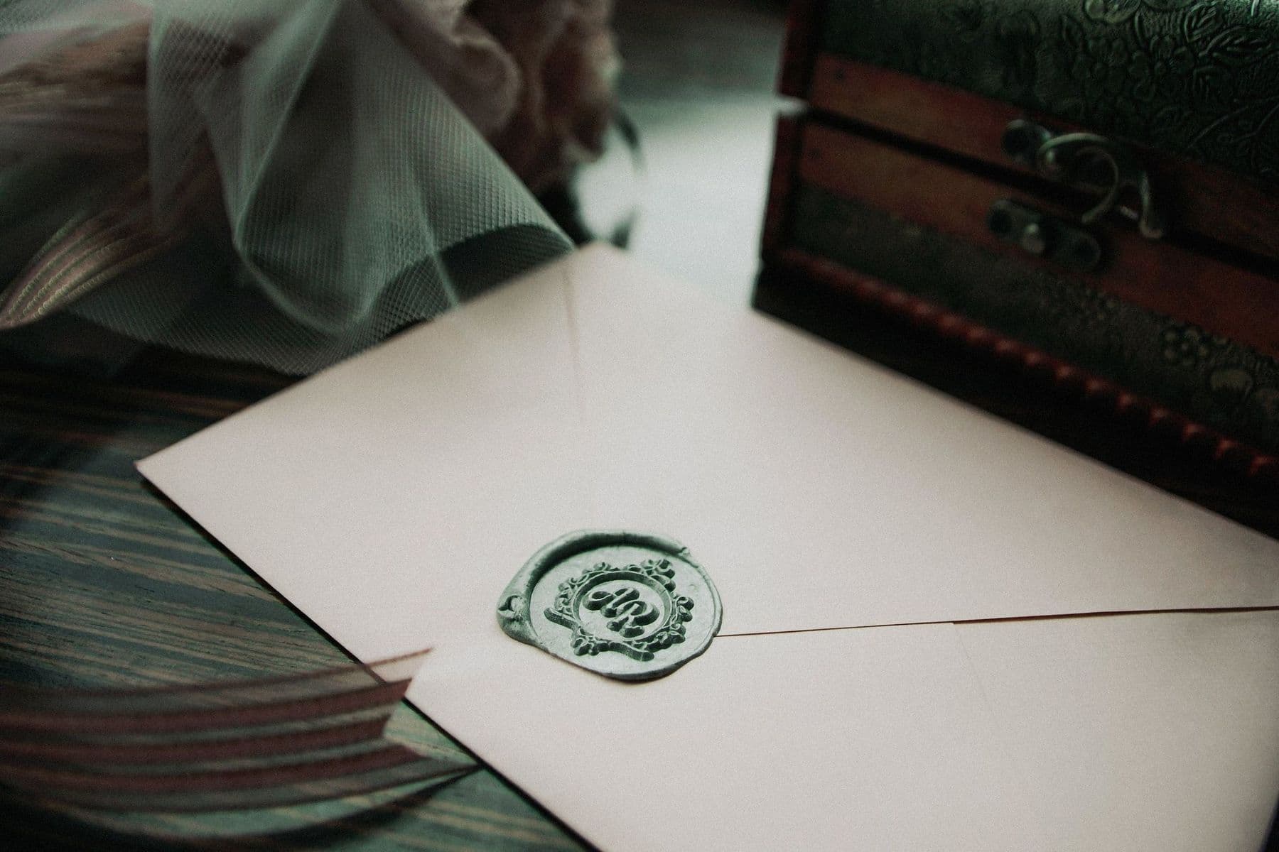 An envelope closed with a wax seal.